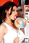 Naked big titted heartbreaker Tera Patrick poses naked with huge lollipop
