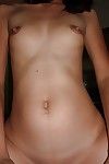 Thai prostitute Dang receiving cumshot on hairy MILF vagina