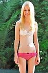Angelic golden-haired girl Kennedy Kressler in pink underclothes plasy with her meaty fur pie