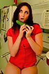 This marvelous and impressive brunette teen is inserting enormous cucumber in her skillful face hole