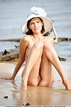 Beach babe Suzanna A in clothing with legs wide open flaunting her shaved cage of love