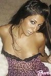 Hot dark haired chica Raven Riley exposes her shaved pussy and slides fingers in her hole