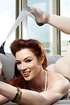 Redhead teaser in stockings Stoya lifts the petticoat up and sexily plays with her undressed pussy