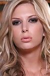 Glamorous blonde Brooke Banner in short blue dress spreads her shaved pussy lips