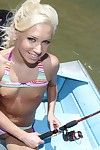 Blue eyed blonde girl Kacey Jordan gets her bald pussy fucked on a boat after fishing