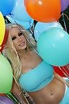 Blonde pornstar Gina Lynn with huge tits and shaved pussy poses naked with balloons