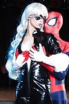 Blonde latex attired cosplay enthusiast with big tits giving big cock a bj