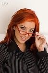 Four-eyed european redhead Ashley Robbins shows off her big melons and snatch
