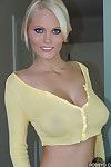 Graceful blonde temptress demonstrating her ravishing round boobs