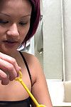 Asian first timer Jade blowing bubbles while exhibiting neatly trimmed twat