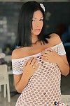 Sexy Karla Spice with lingerie under her white fishnet dress shows off her latin ass