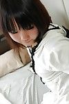 Eastern youthful Chihiro Tanabe undressing and stretching her twat lips in close up