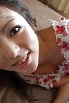 Oriental amateur Nao Miyazaki undressing and exposing her vagina in close up