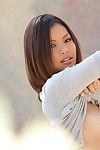Appealing Chinese babe in fixed jeans Khyanna Song is flashing her faultless standard billibongs exposed