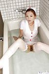 Fascinating Chinese nurse in  Ray Ito striptease and pleasant shower-room
