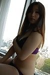 Shy oriental princess with nice-looking smile Shiho Kitahara slipping off her garments