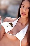 White bikini top clings concerning the perky breasts be expeditious for young hottie Alexis Reverence